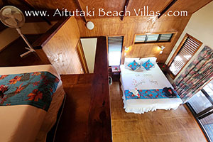 showing the mezzanine with bed and fan