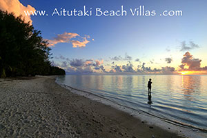 tourist on holiday fishing in Aitutaki Lagoon